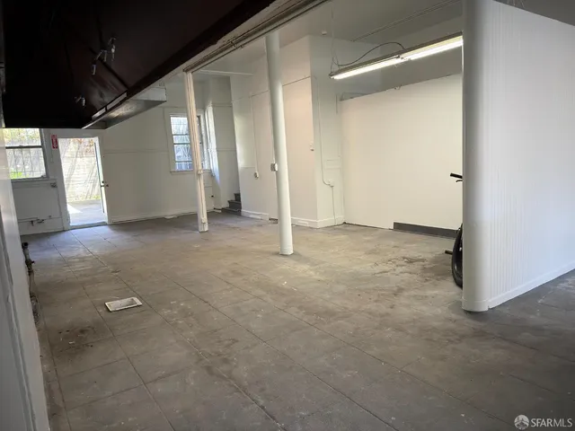 a view of balcony with wooden floor