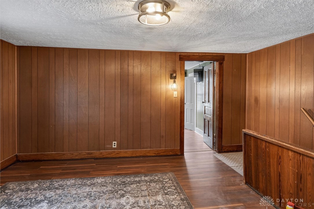 1726 Morgan Street Springfield, OH 45503 - Photo 27 of 30 This inviting space features classic wood paneling and warm flooring, perfect for cozy gatherings.