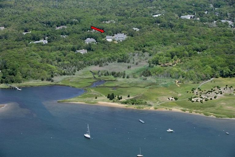 85 Seapuit Road Osterville, MA 02655 - Photo 20 of 22 a view of a forest with a street