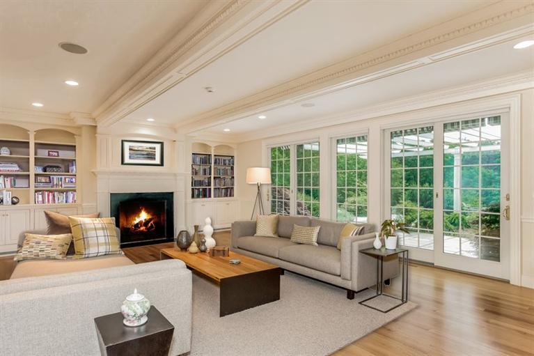 85 Seapuit Road Osterville, MA 02655 - Photo 3 of 22 a living room with furniture and a fireplace