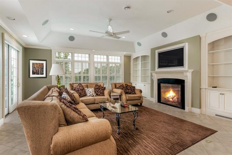 85 Seapuit Road Osterville, MA 02655 - Photo 5 of 22 a living room with furniture and a fireplace