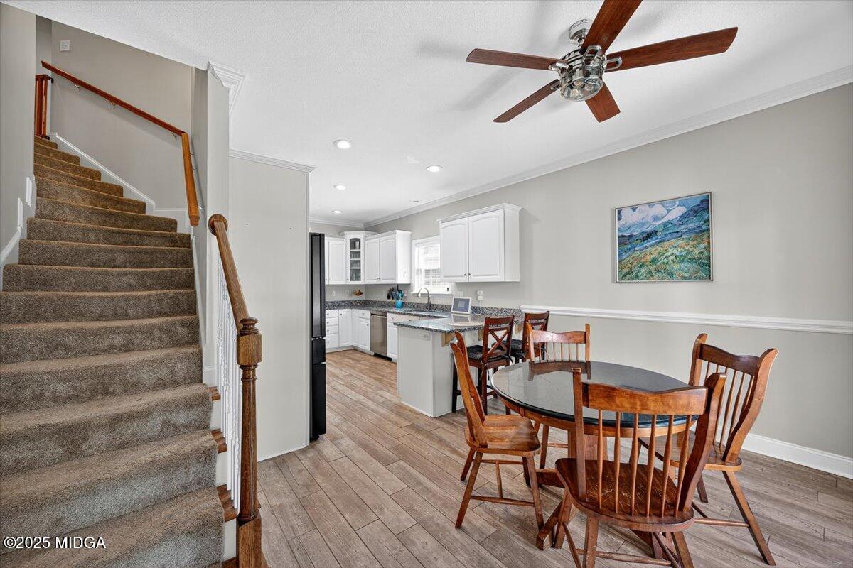 9481 Hopewell Road Musella, GA 31066 - Photo 17 of 72 a view of a dining room with furniture and wooden floor