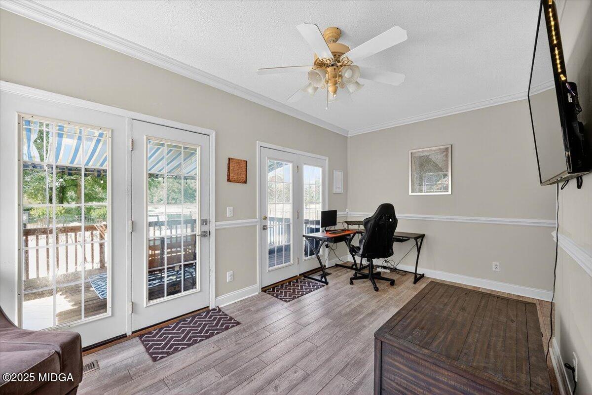 9481 Hopewell Road Musella, GA 31066 - Photo 25 of 72 a workspace with wooden floor and a window