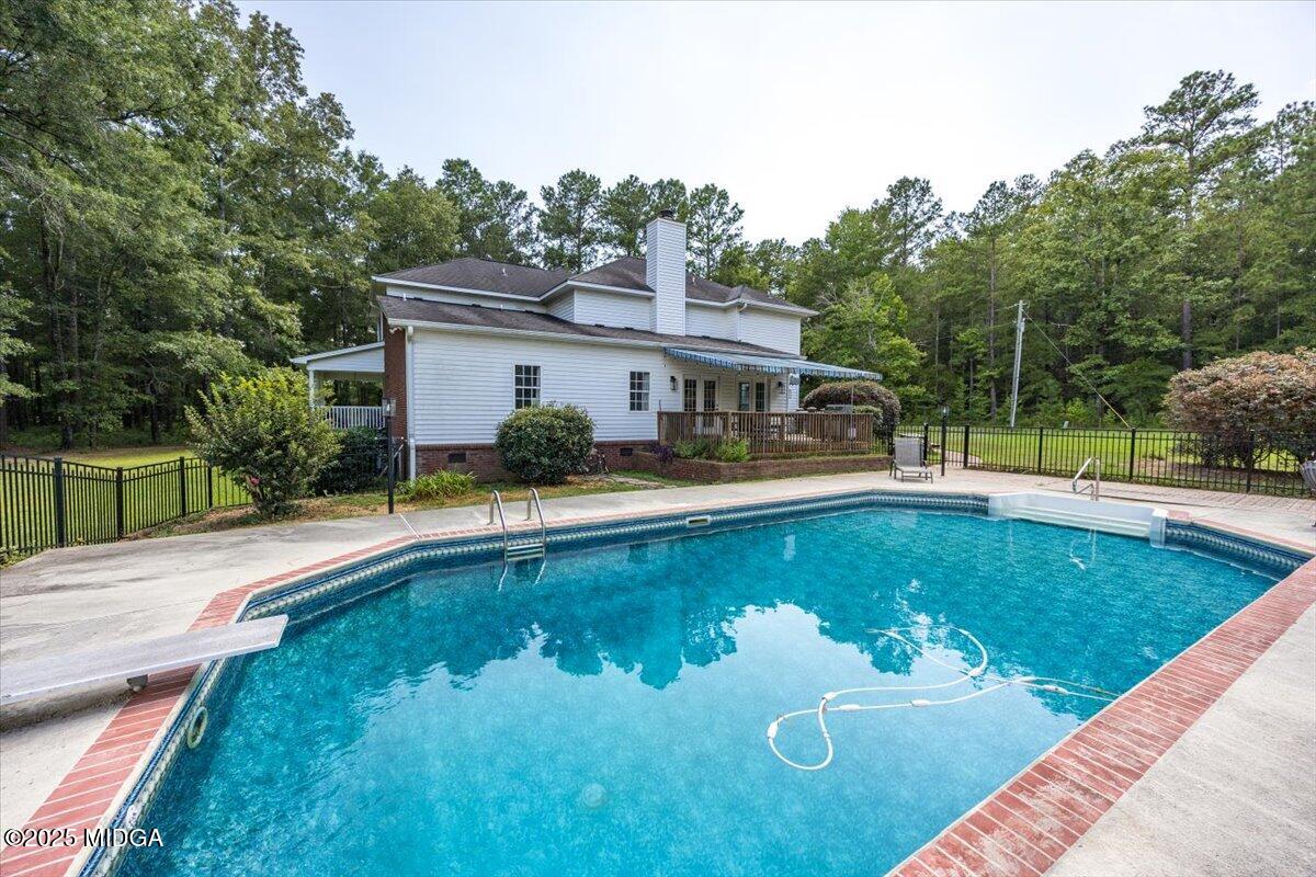 9481 Hopewell Road Musella, GA 31066 - Photo 40 of 72 a view of a house with swimming pool