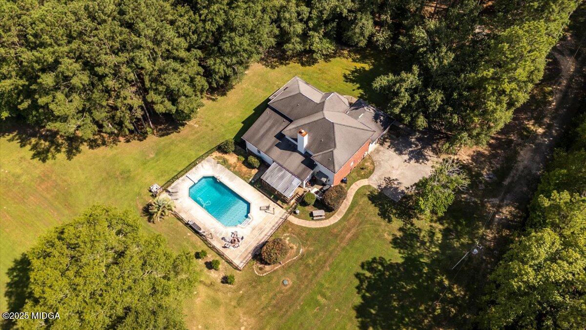 9481 Hopewell Road Musella, GA 31066 - Photo 46 of 72 an aerial view of a house with swimming pool and ocean view