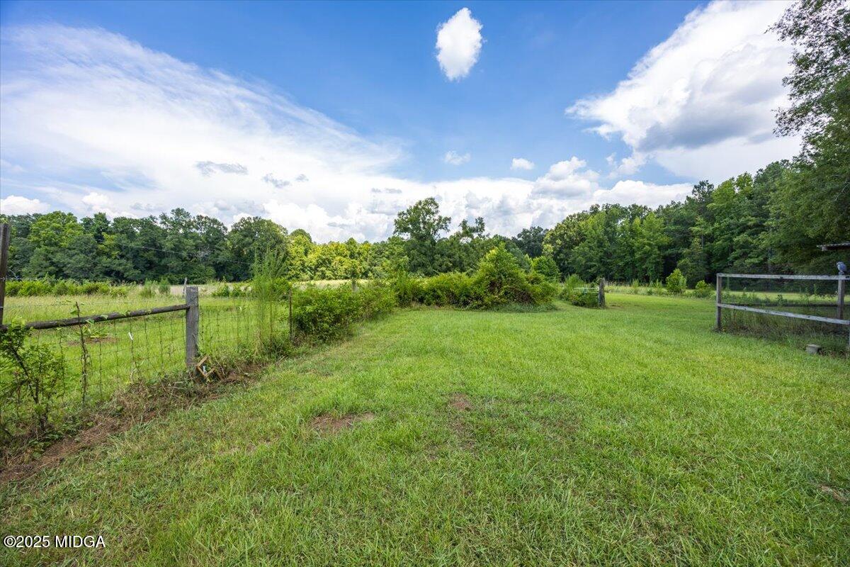 9481 Hopewell Road Musella, GA 31066 - Photo 54 of 72 a view of a lake with a big yard