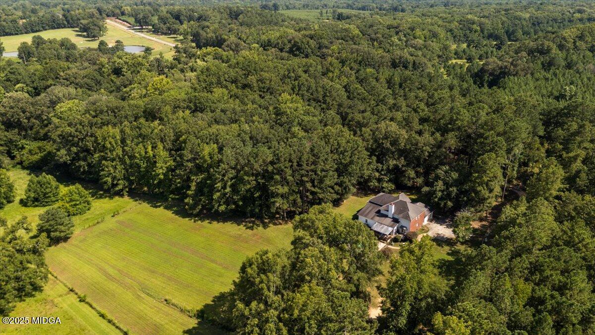 9481 Hopewell Road Musella, GA 31066 - Photo 56 of 72 a view of a house with a yard