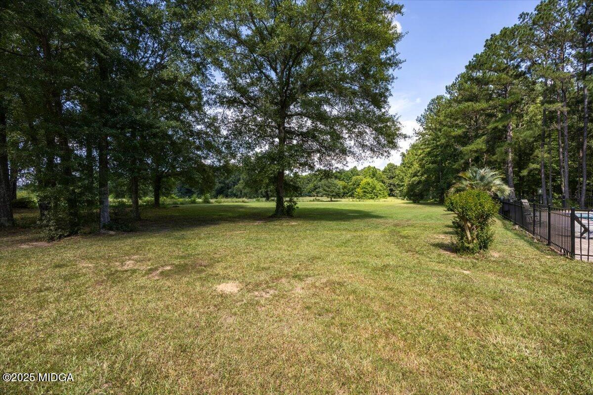9481 Hopewell Road Musella, GA 31066 - Photo 67 of 72 a view of outdoor space with deck and yard
