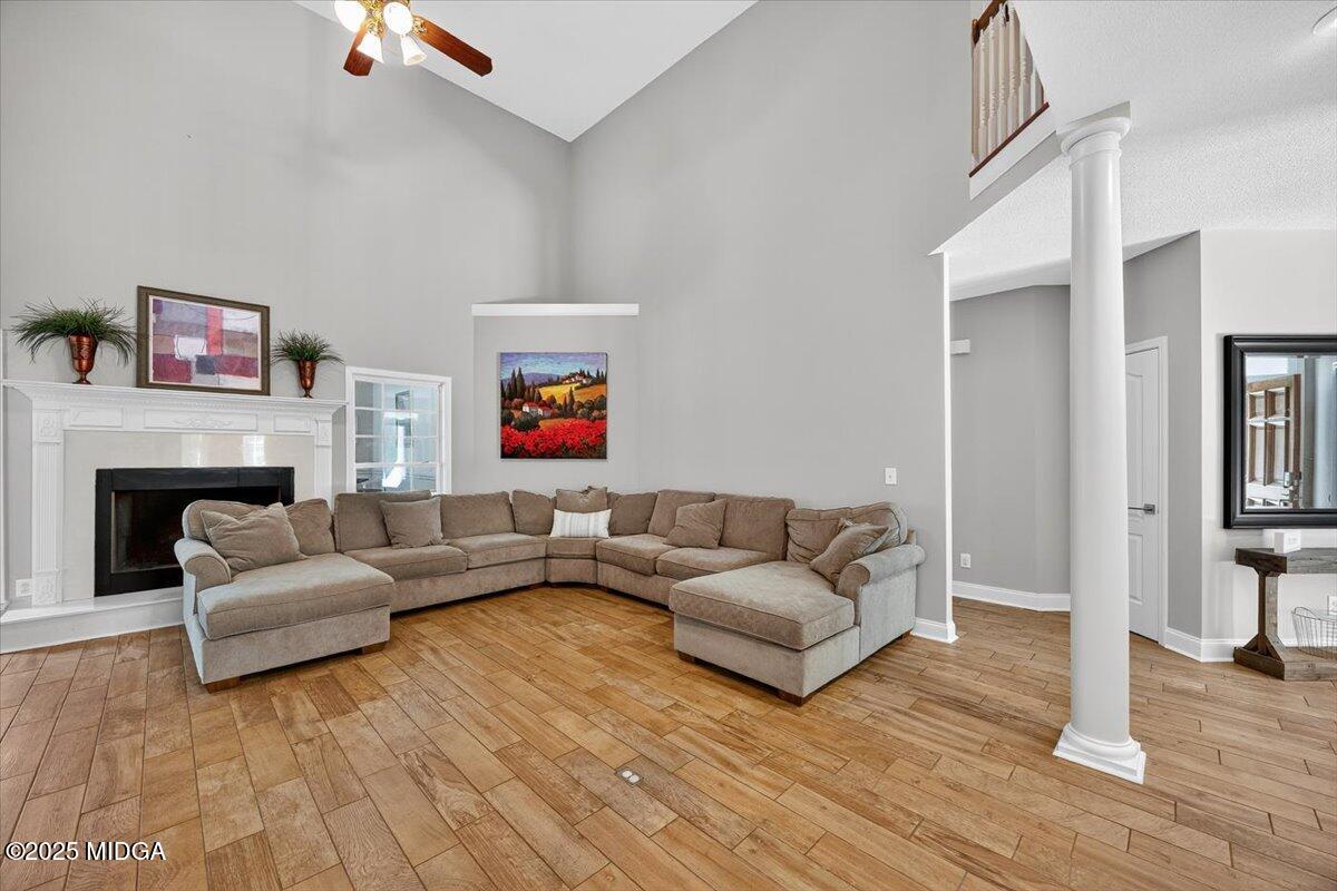9481 Hopewell Road Musella, GA 31066 - Photo 8 of 72 a living room with furniture and a fireplace