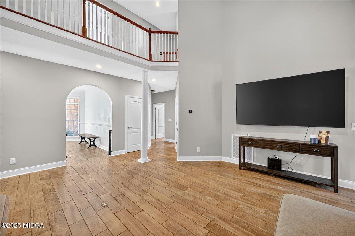 9481 Hopewell Road Musella, GA 31066 - Photo 10 of 72 a living room with furniture and a flat screen tv