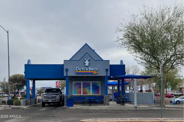 a store with outdoor seating area