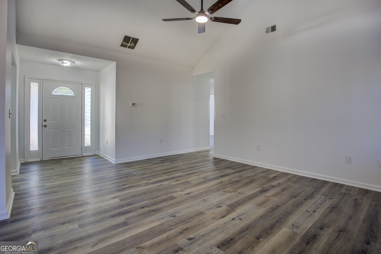40 Brandon Drive Covington, GA 30016 - Photo 11 of 40 wooden floor in an empty room