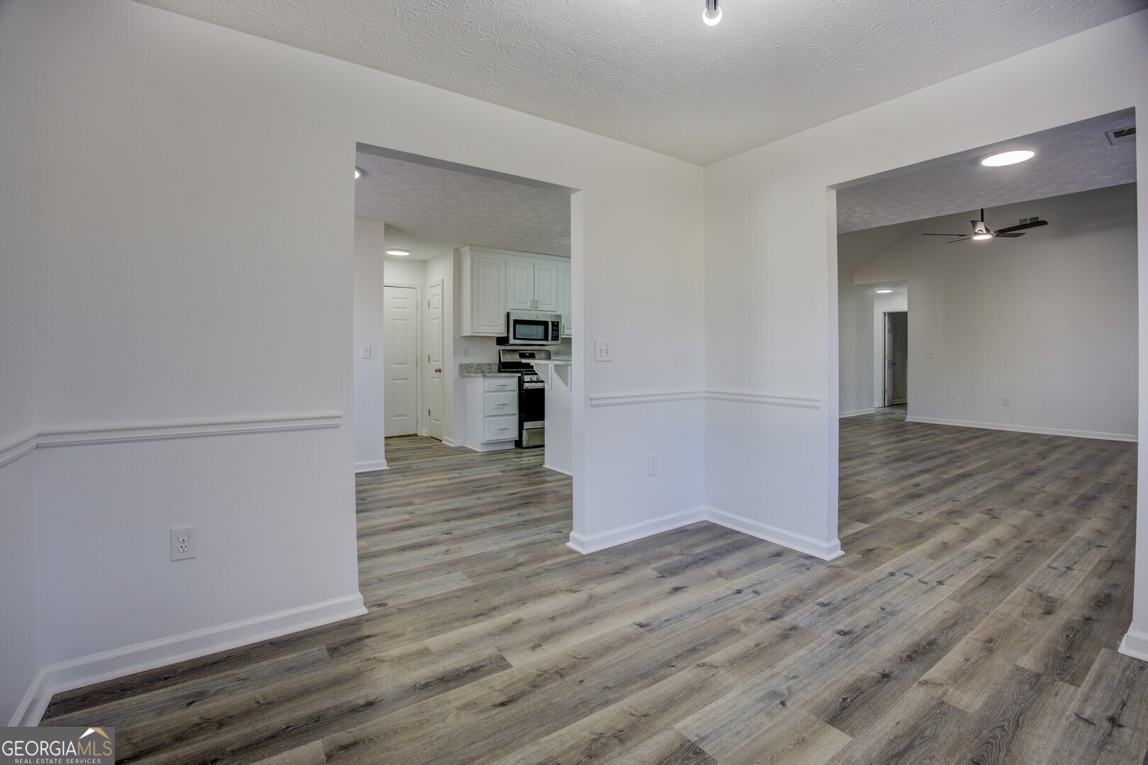 40 Brandon Drive Covington, GA 30016 - Photo 17 of 40 wooden floor in an empty room with wooden floor