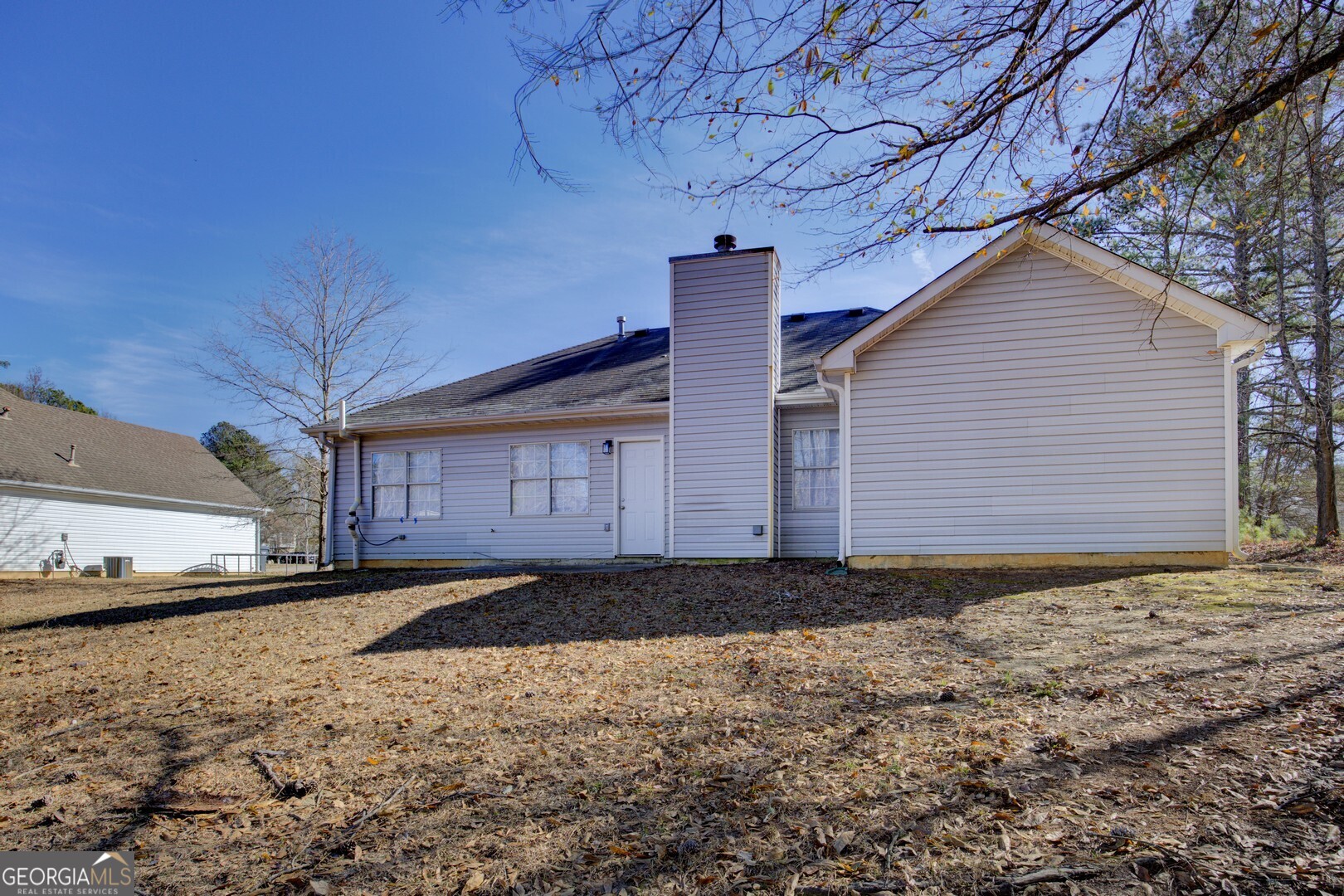 40 Brandon Drive Covington, GA 30016 - Photo 38 of 40 a view of a house with a yard