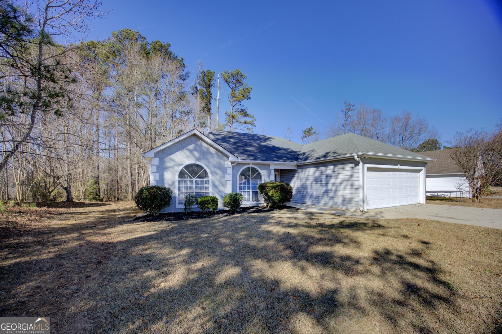 40 Brandon Drive Covington, GA 30016 - Photo 4 of 40 a view of a house with a yard