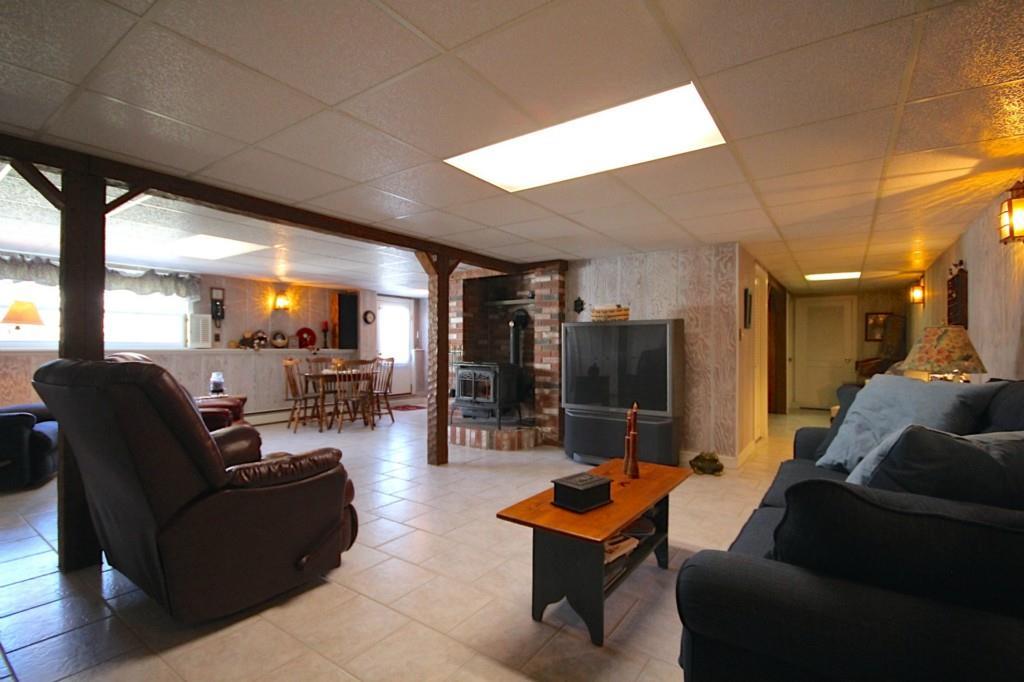142 Louden Road Saco, ME 04072 - Photo 22 of 35 Family room with dining area.