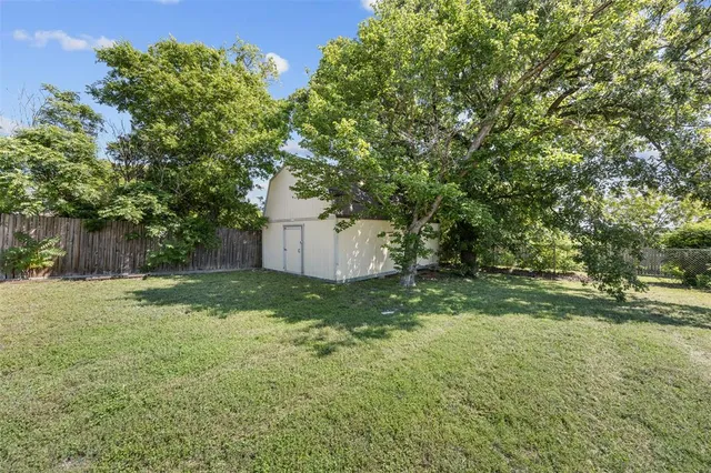 a fire hydrant in the middle of a field