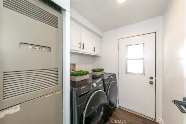 a view of a storage & utility room with a sink