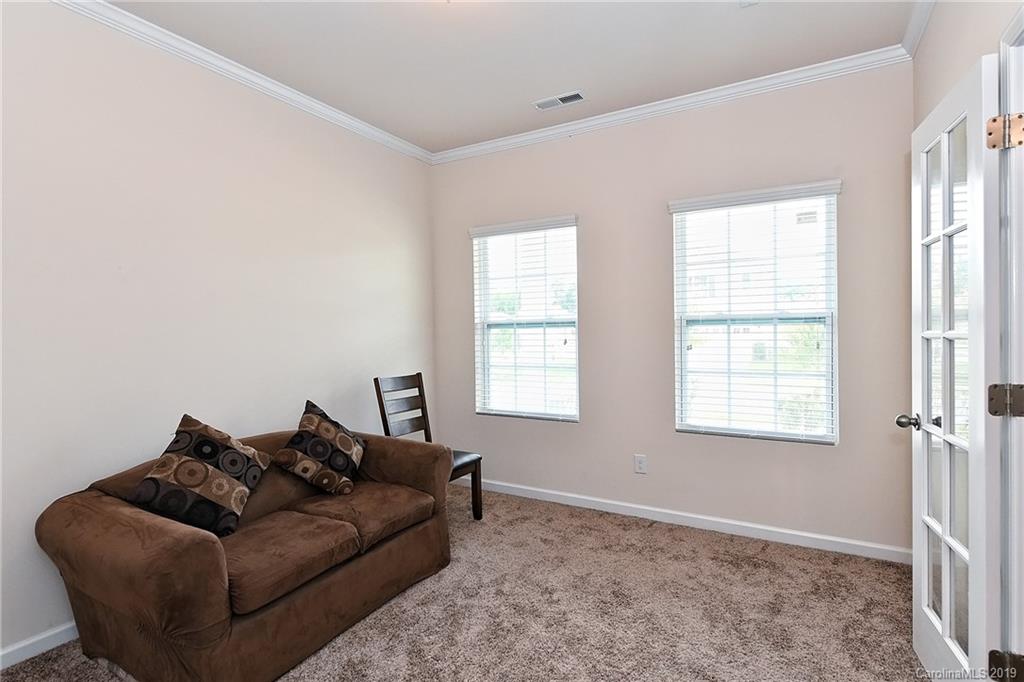 1580 Spring Blossom Trail Fort Mill, SC 29708 - Photo 2 of 22 a living room with furniture and a window