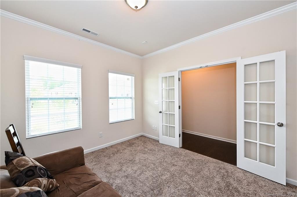 1580 Spring Blossom Trail Fort Mill, SC 29708 - Photo 3 of 22 a living room with furniture and a window