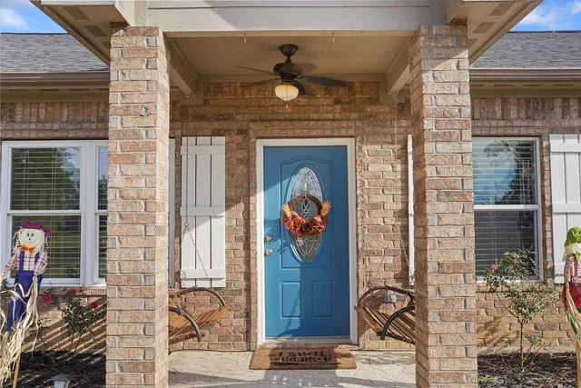 a front view of a house with outdoor shower