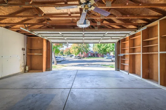 a view of a room with wooden walls