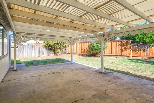 a view of backyard and porch
