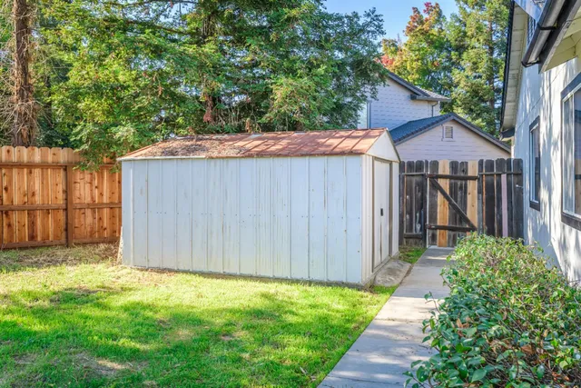 a house view with a backyard space