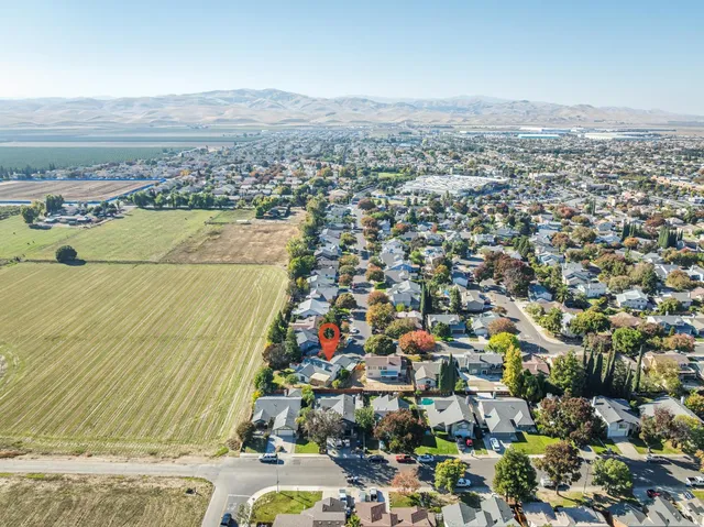 an aerial view of residential building and city view