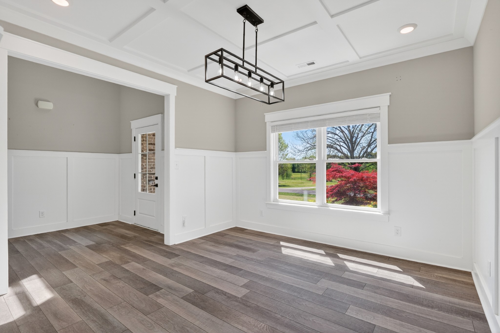 27 Hancock Road Fayetteville, TN 37334 - Photo 20 of 62 a view of an empty room with wooden floor and a window