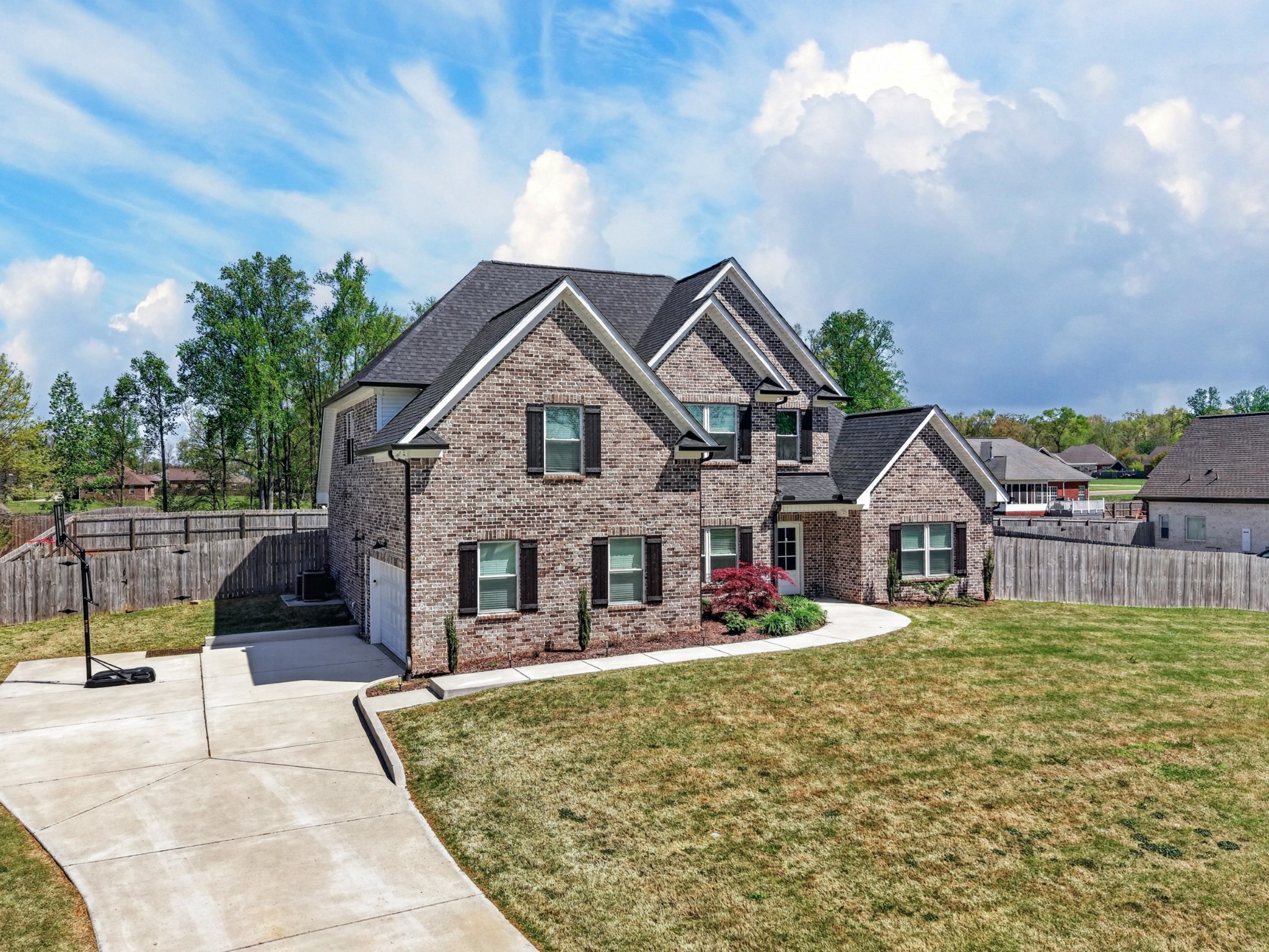 27 Hancock Road Fayetteville, TN 37334 - Photo 4 of 62 a front view of a house with a yard