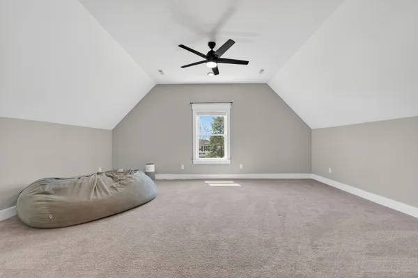 a bed room with a bed and a couch