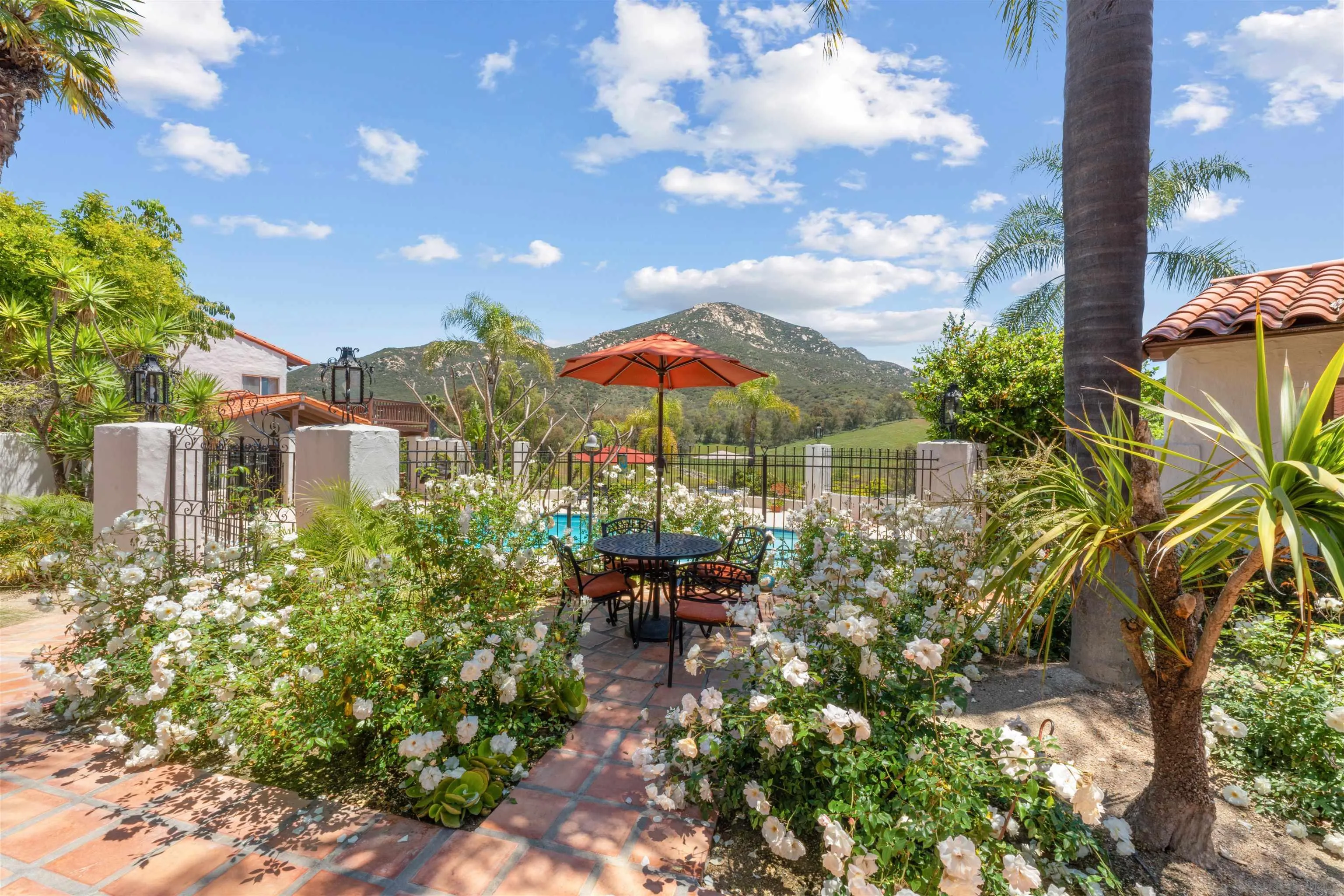 17156 Dos Hermanos Road Poway, CA 92064 - Photo 13 of 59 a view of a lake with a garden
