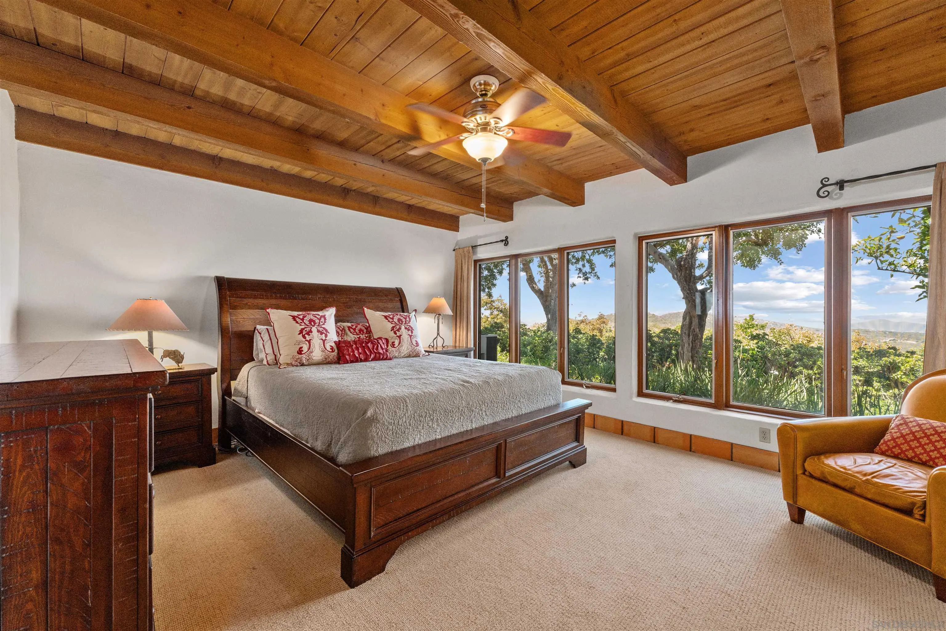 17156 Dos Hermanos Road Poway, CA 92064 - Photo 34 of 59 a bed sitting in a bedroom next to a window