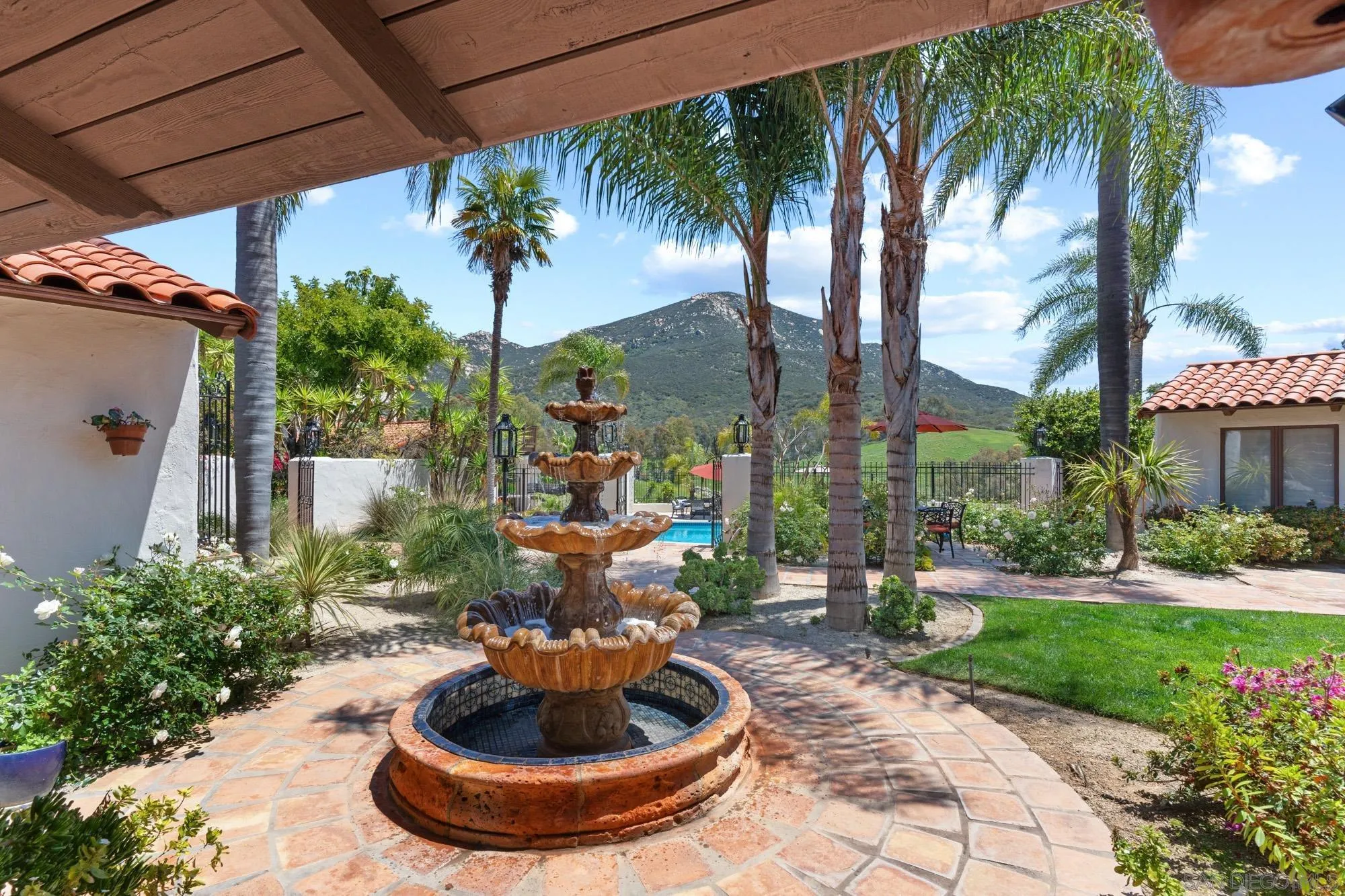 17156 Dos Hermanos Road Poway, CA 92064 - Photo 9 of 59 a view of a backyard with potted plants