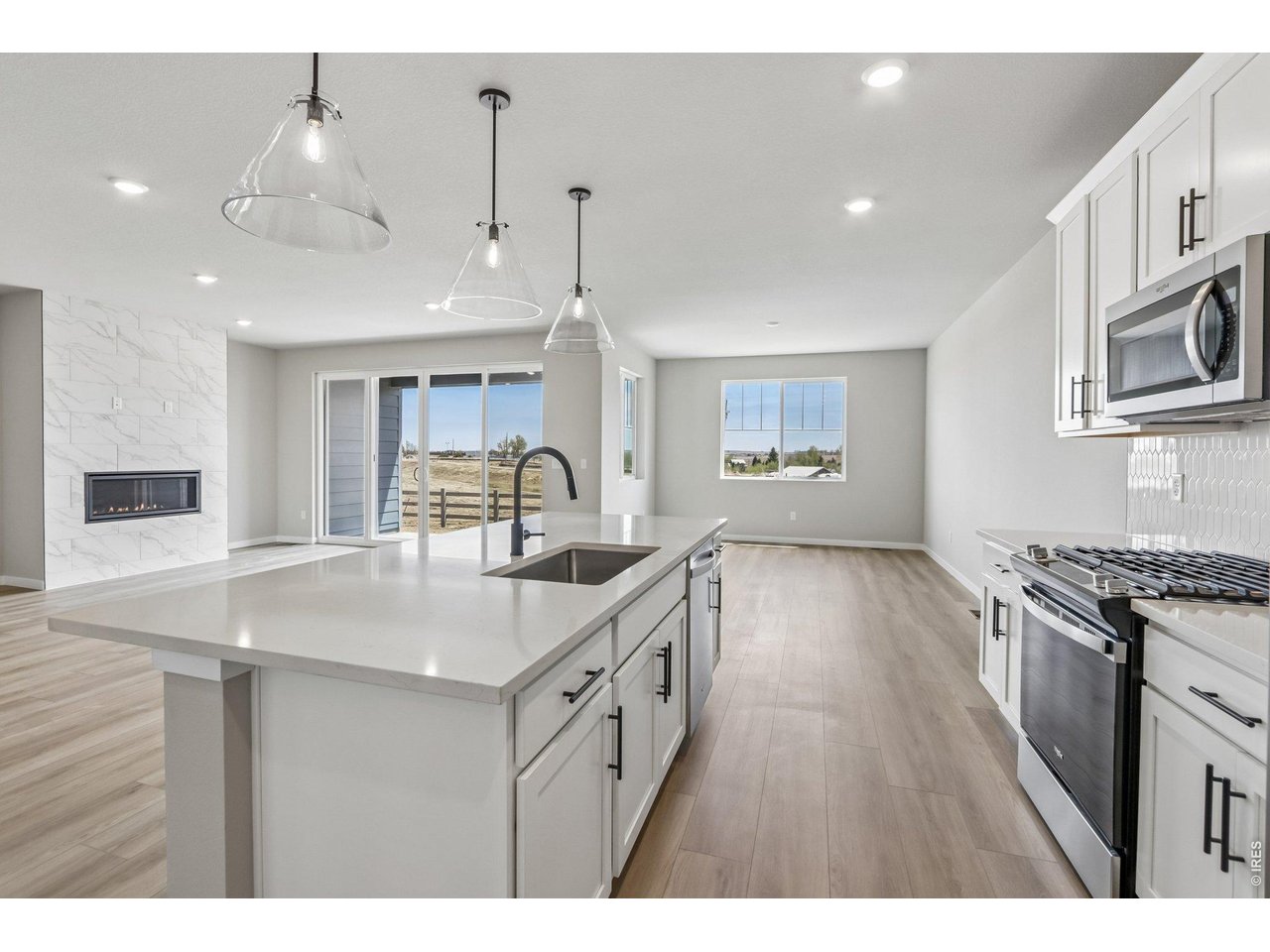398 Rustic Barn Lane Berthoud, CO 80513 - Photo 16 of 30 Gleaming white cabinets and quartz countertops