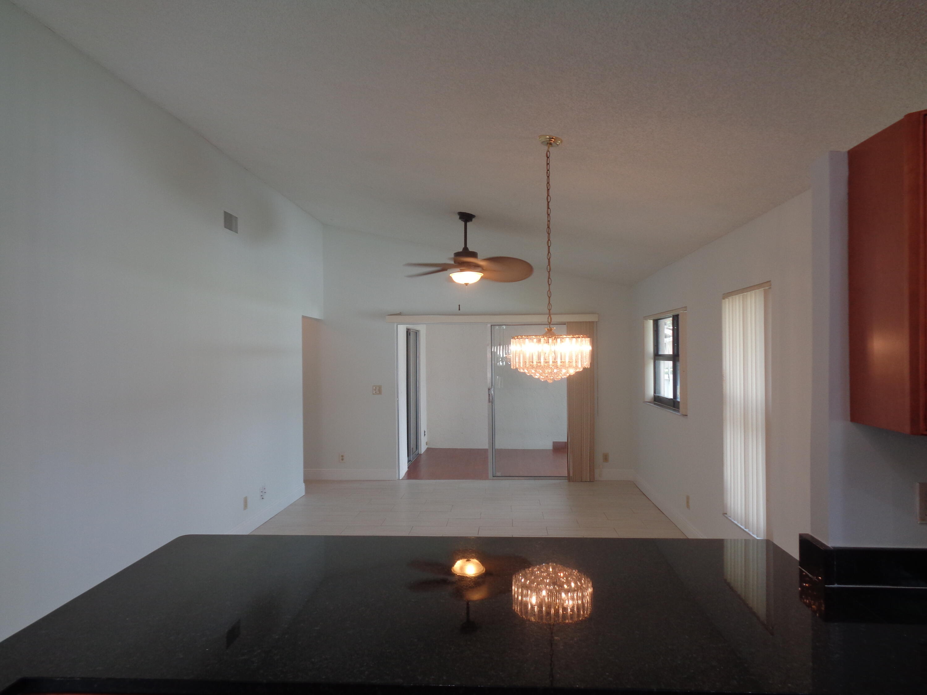 8106 Springtree Road, Unit B Boca Raton, FL 33496 - Photo 6 of 46 Dining/Living Room