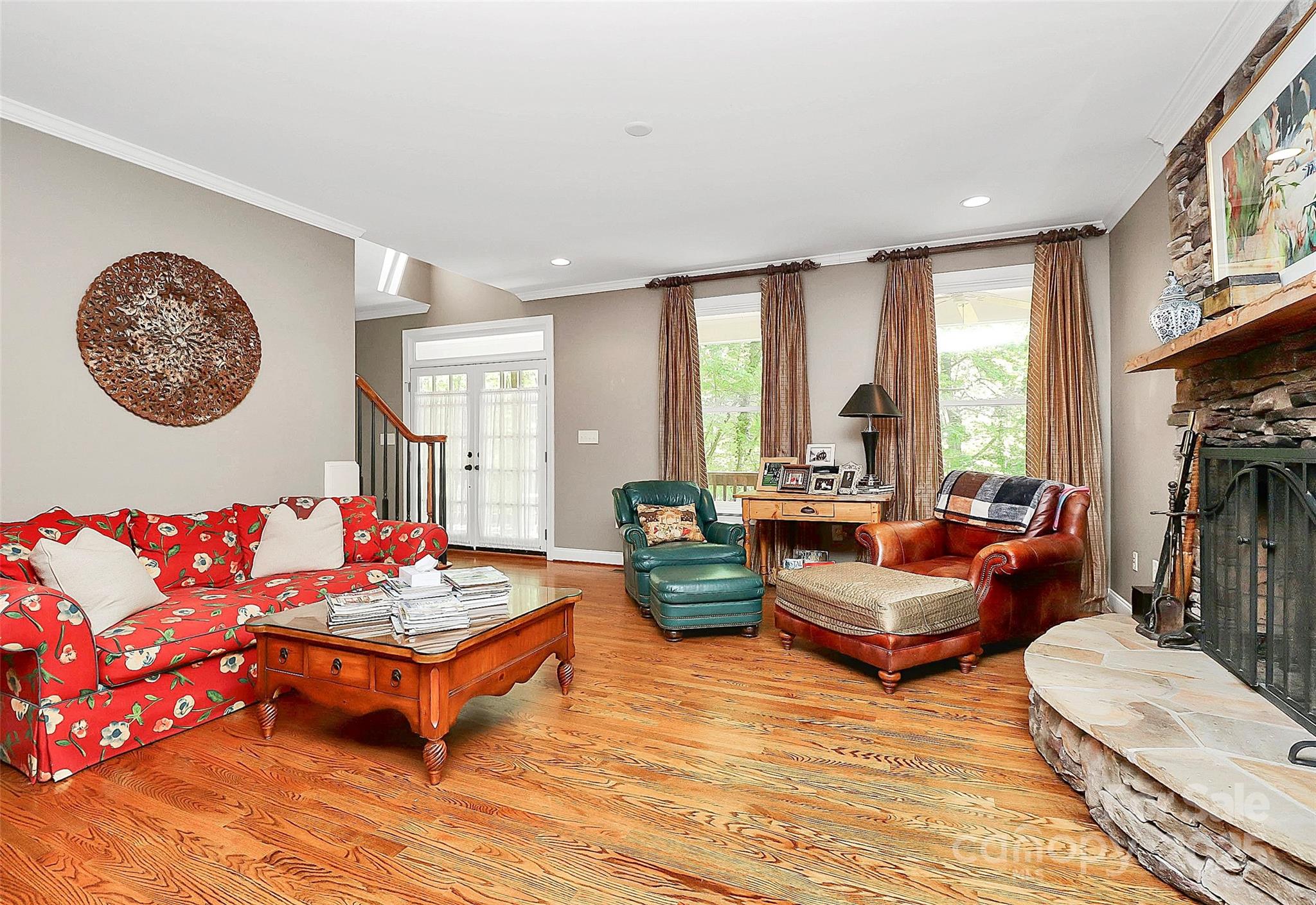 729 Lochaven Road Waxhaw, NC 28173 - Photo 11 of 41 a living room with fireplace furniture and a large window