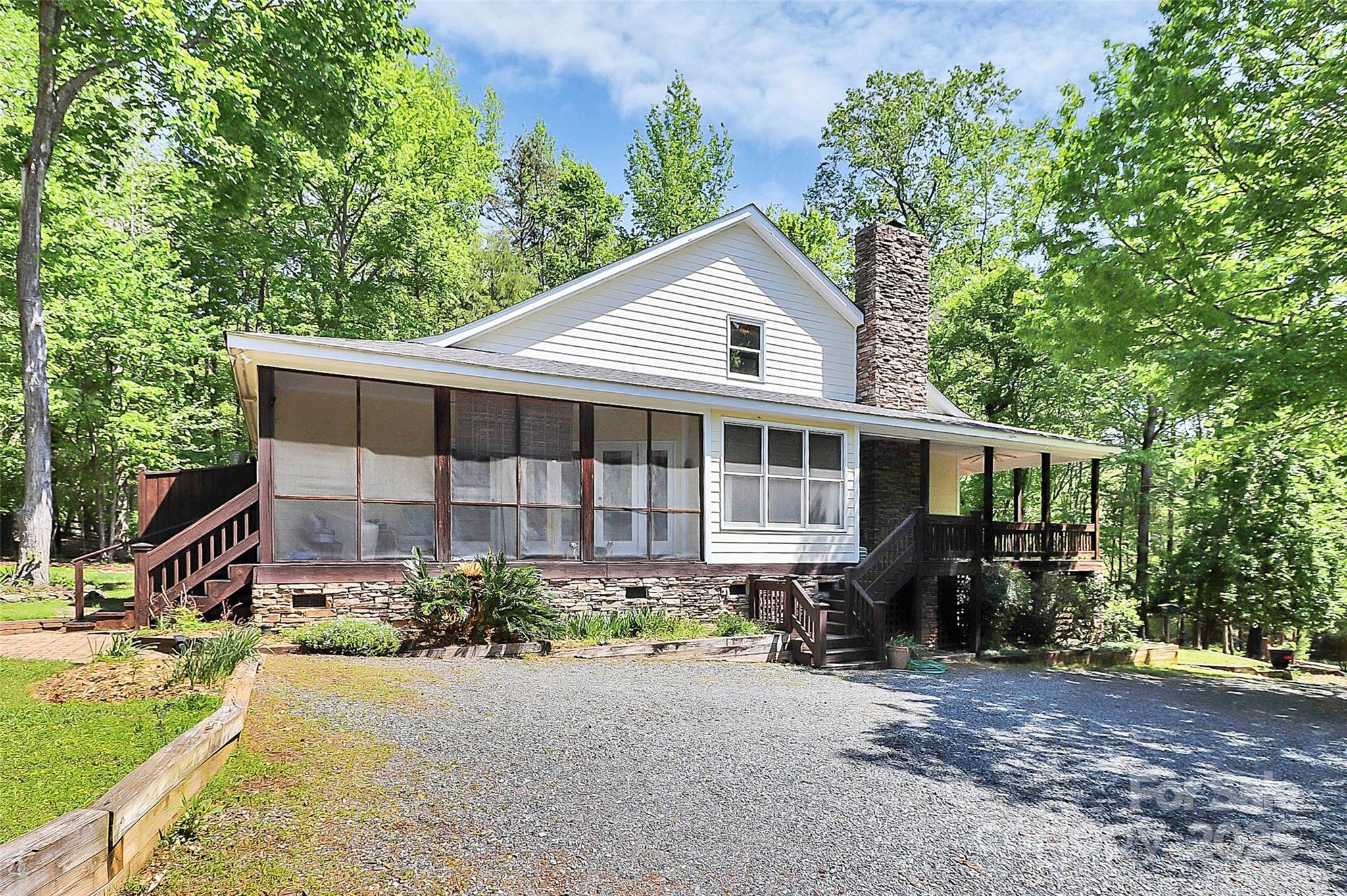 729 Lochaven Road Waxhaw, NC 28173 - Photo 2 of 41 a front view of a house with garden