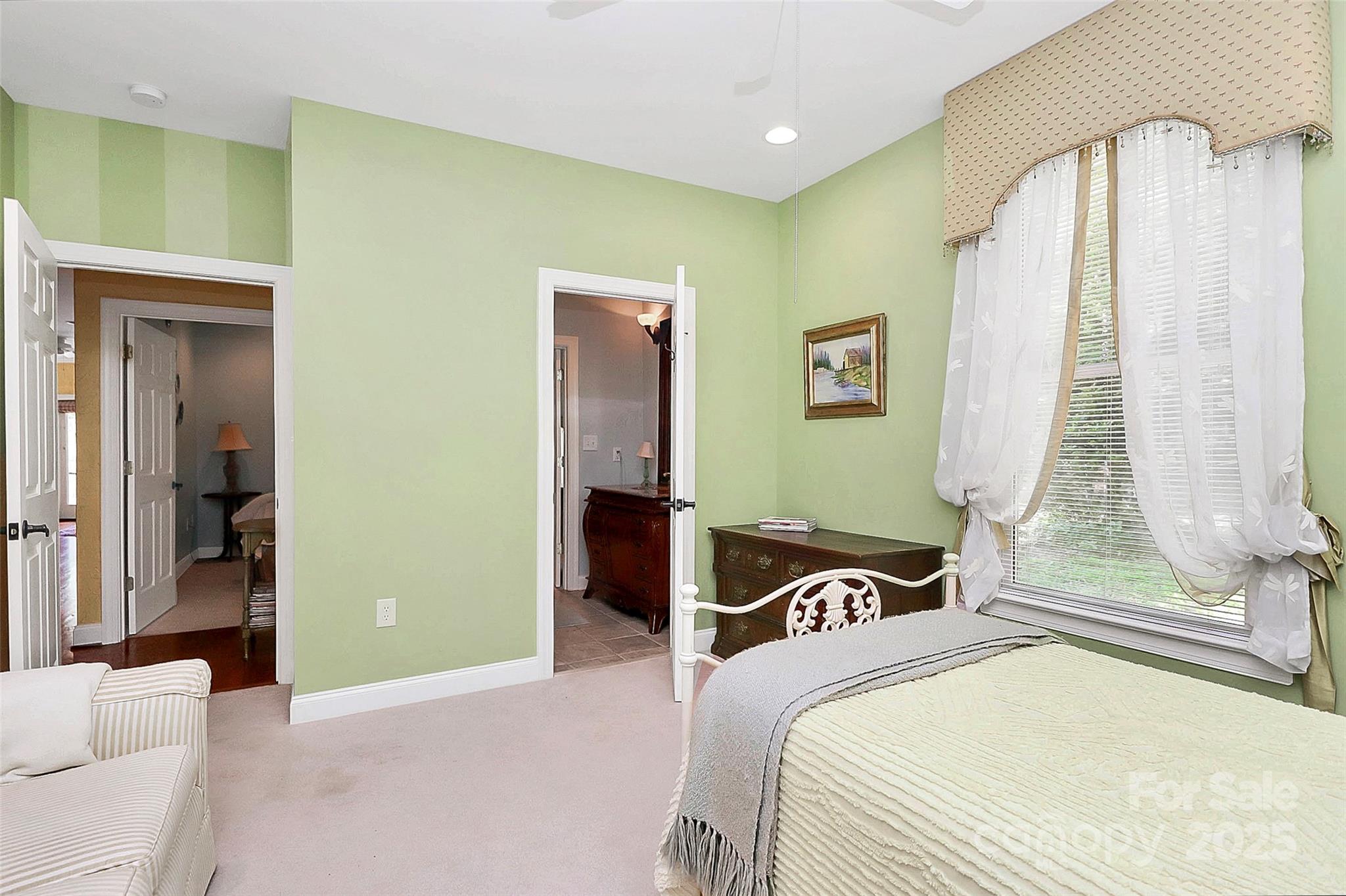 729 Lochaven Road Waxhaw, NC 28173 - Photo 23 of 41 a bedroom with a bed and a window