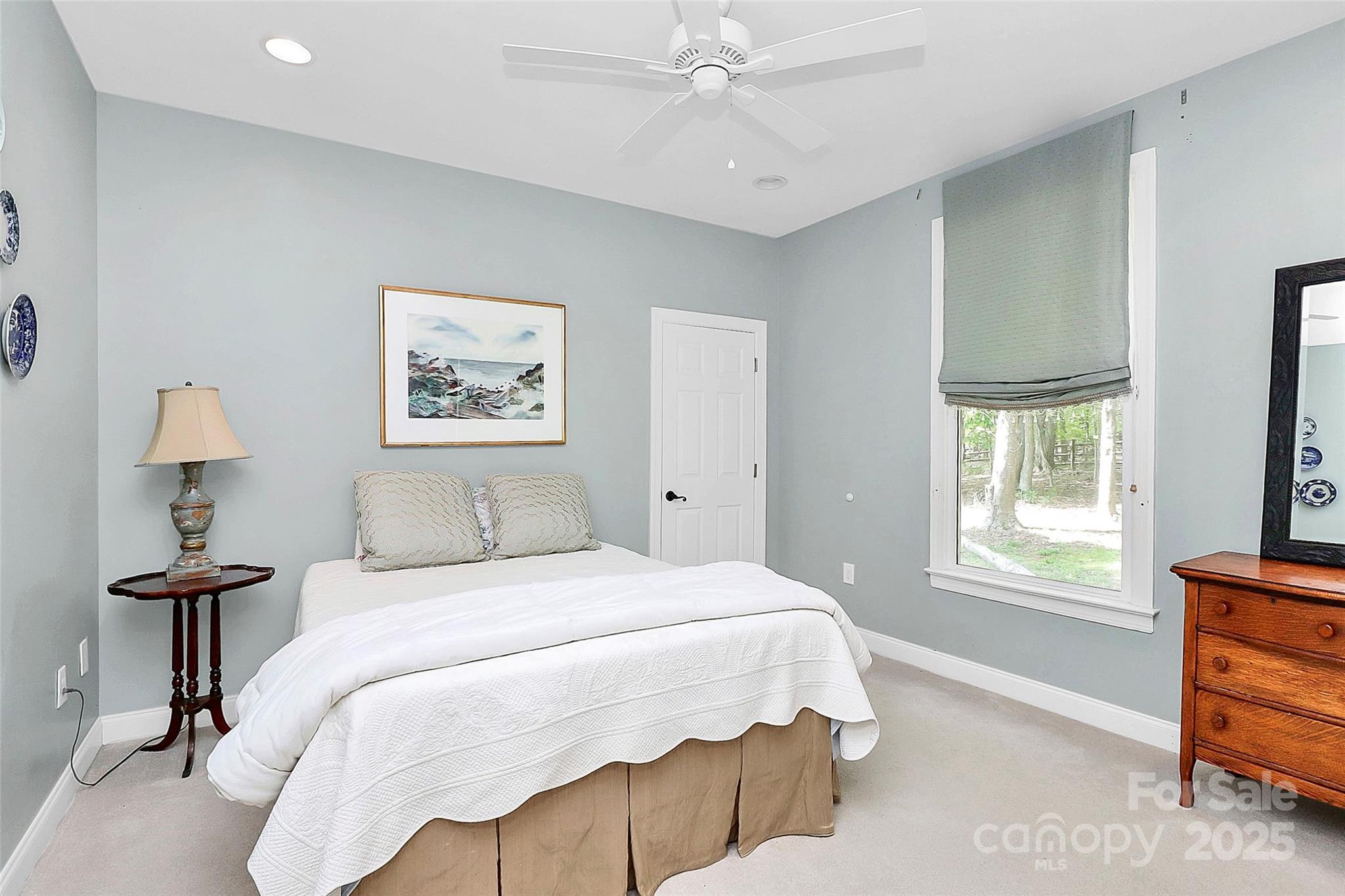 729 Lochaven Road Waxhaw, NC 28173 - Photo 24 of 41 a bedroom with a bed and a window