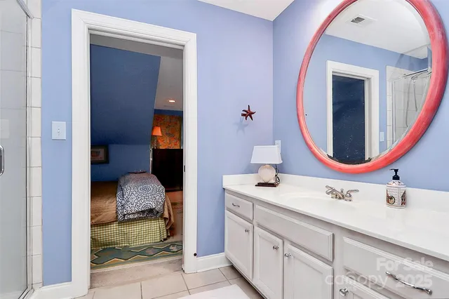 a bathroom with a shower and toilet