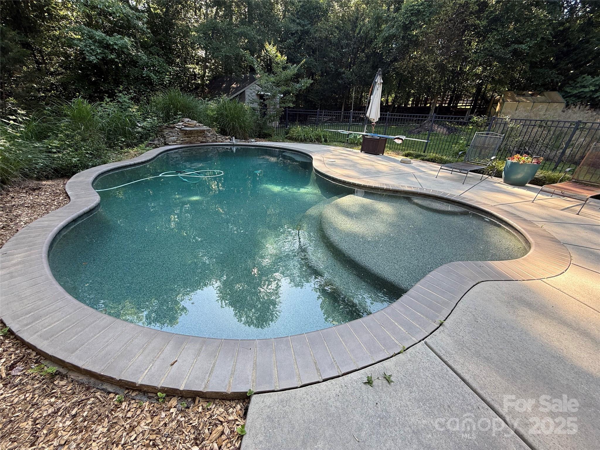 729 Lochaven Road Waxhaw, NC 28173 - Photo 3 of 41 a view of a wooden floor with a yard