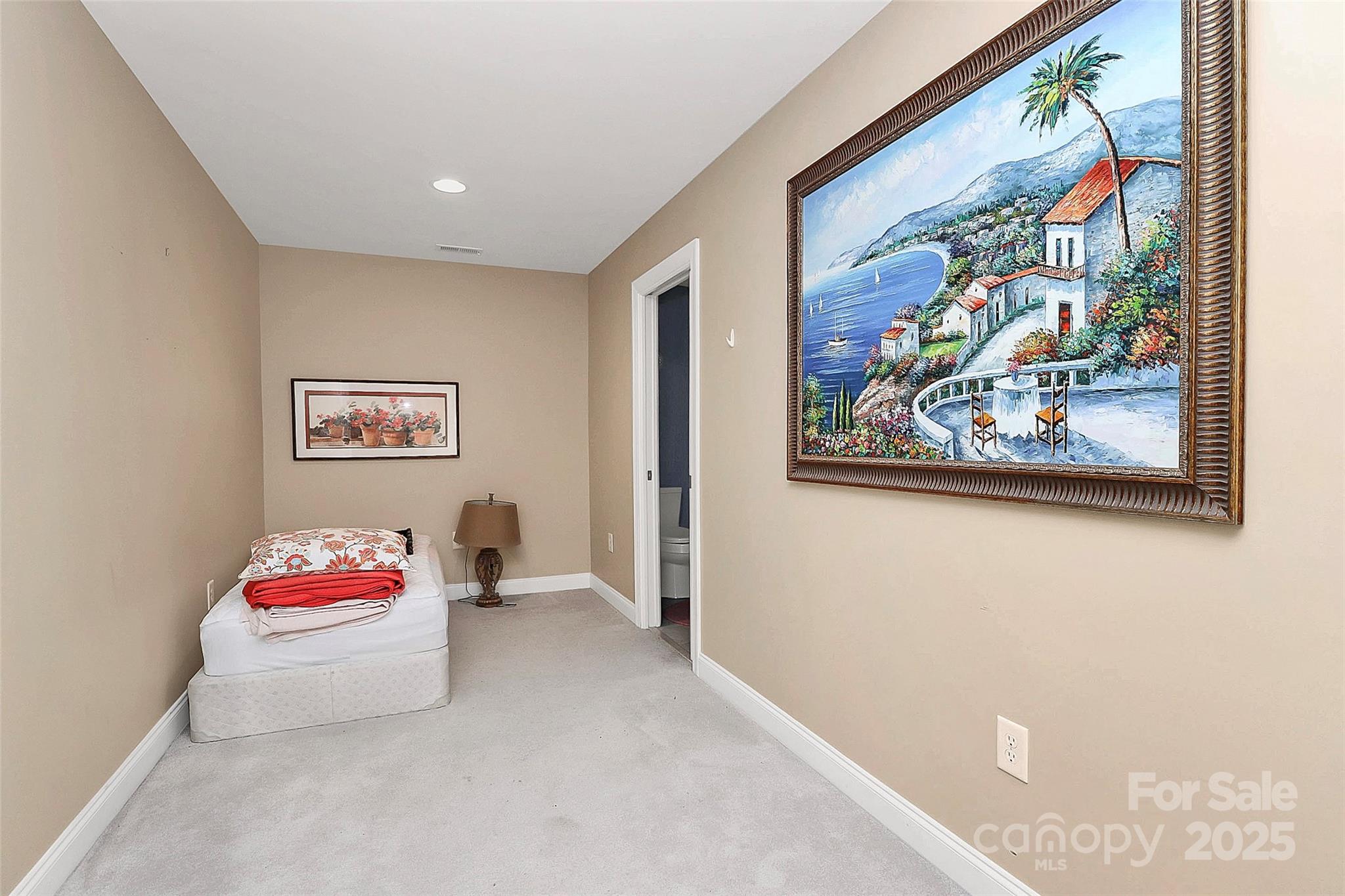 729 Lochaven Road Waxhaw, NC 28173 - Photo 31 of 41 a very nice looking room with a picture of wall painting on the wall