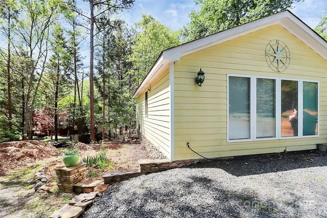 a view of kitchen with furniture and wooden floor