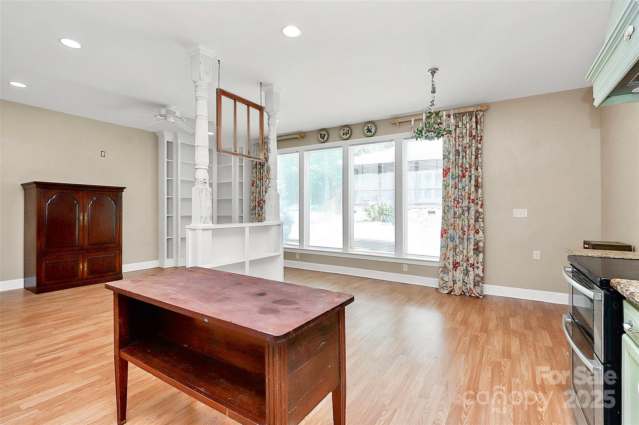 729 Lochaven Road Waxhaw, NC 28173 - Photo 37 of 41 a view of a livingroom with furniture window and wooden floor
