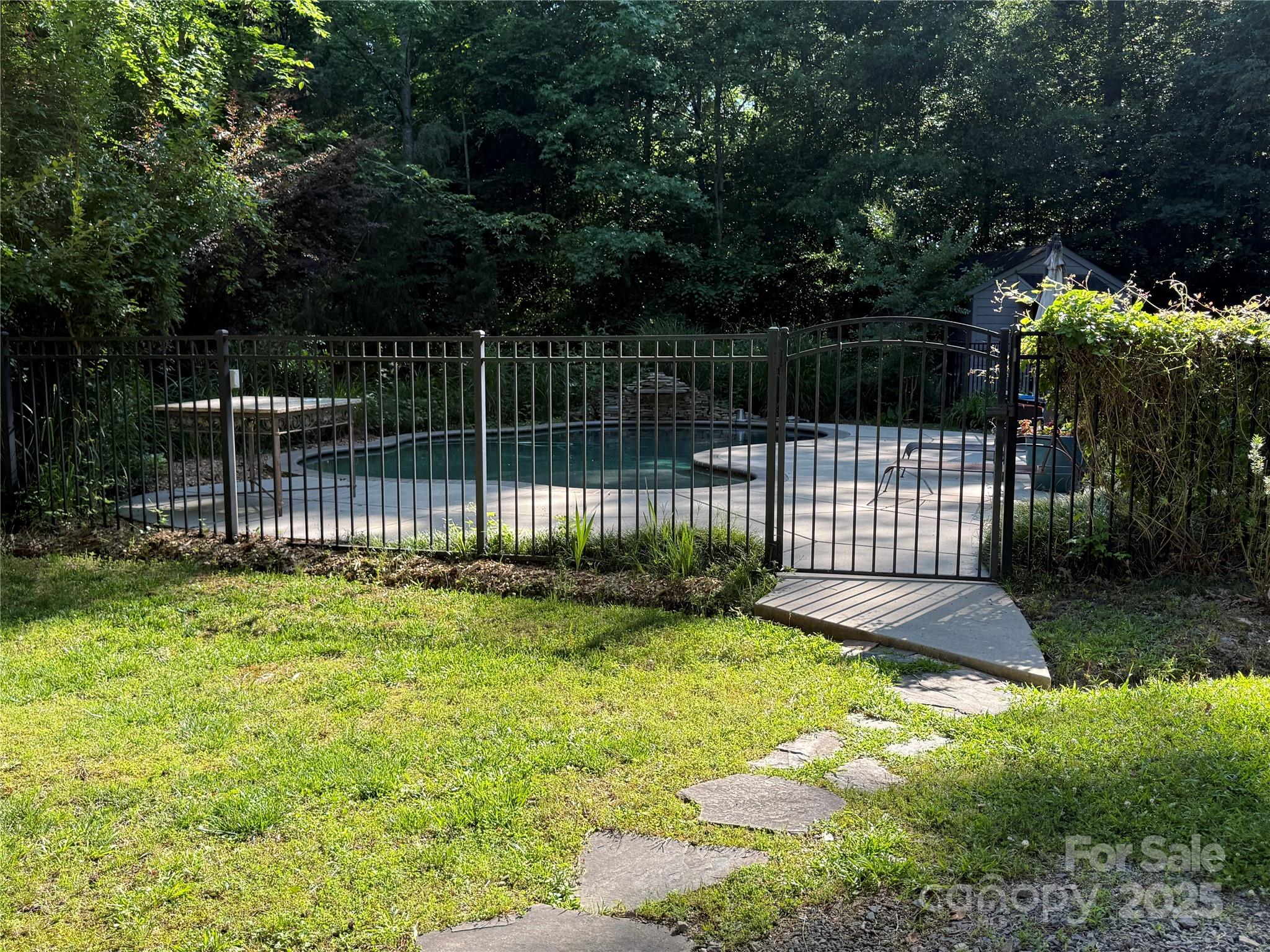 729 Lochaven Road Waxhaw, NC 28173 - Photo 4 of 41 a view of a backyard with a garden