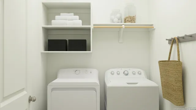 a utility room with dryer and washer