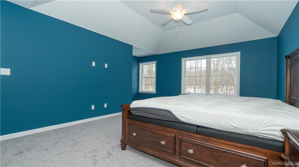 5 Harrier Ridge Drive Wallkill, NY 12589 - Photo 13 of 32 Bedroom with light carpet, a ceiling fan, and lofted ceiling