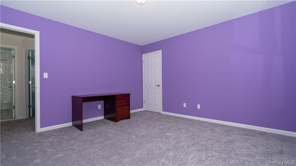 5 Harrier Ridge Drive Wallkill, NY 12589 - Photo 21 of 32 Unfurnished bedroom featuring carpet and baseboards